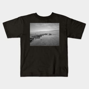 Rock pool on the sandy beach in Cromer, Norfolk Kids T-Shirt